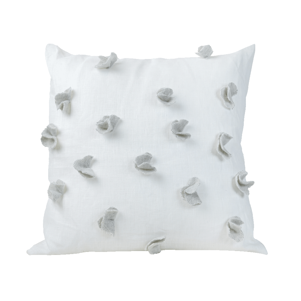 Cuscino in lino bianco con applicazioni di lana